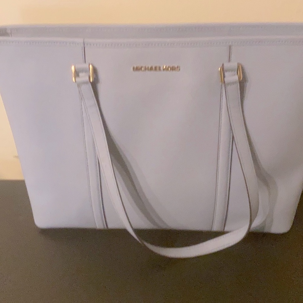 Brand new Michael Kors baby blue
